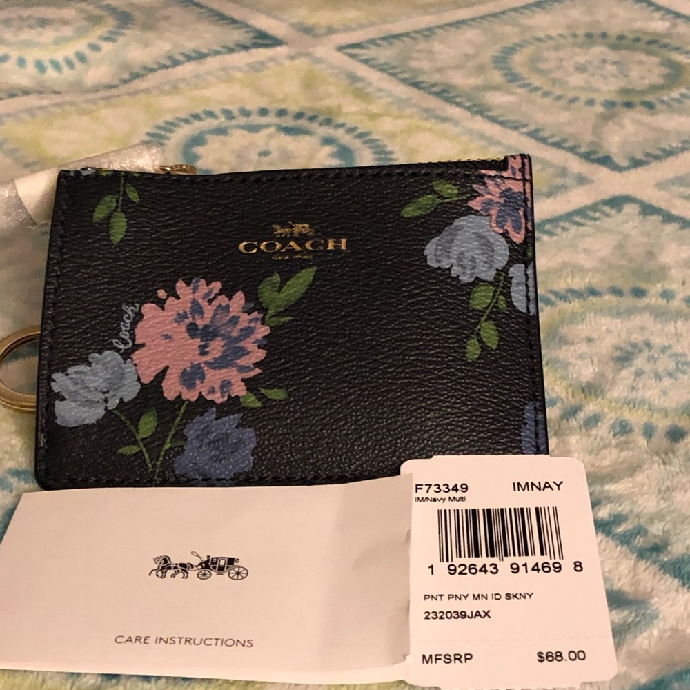 Brand new skinny Coach card case.